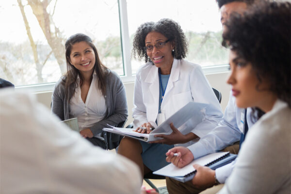 Medical professionals and administrators during a meeting