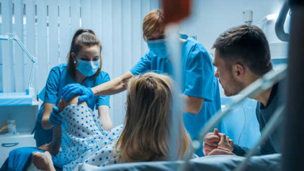 Emergency In The Hospital: Woman Giving Birth