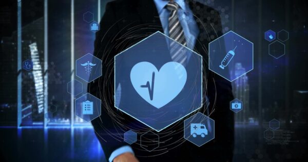 Standing Executive Wearing Suit And Tie Against Night Skyline